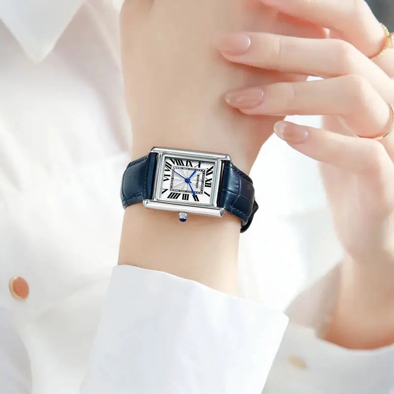 Watch by Simples Market: square-face quartz wristwatch with blue leather strap and Roman numeral dial