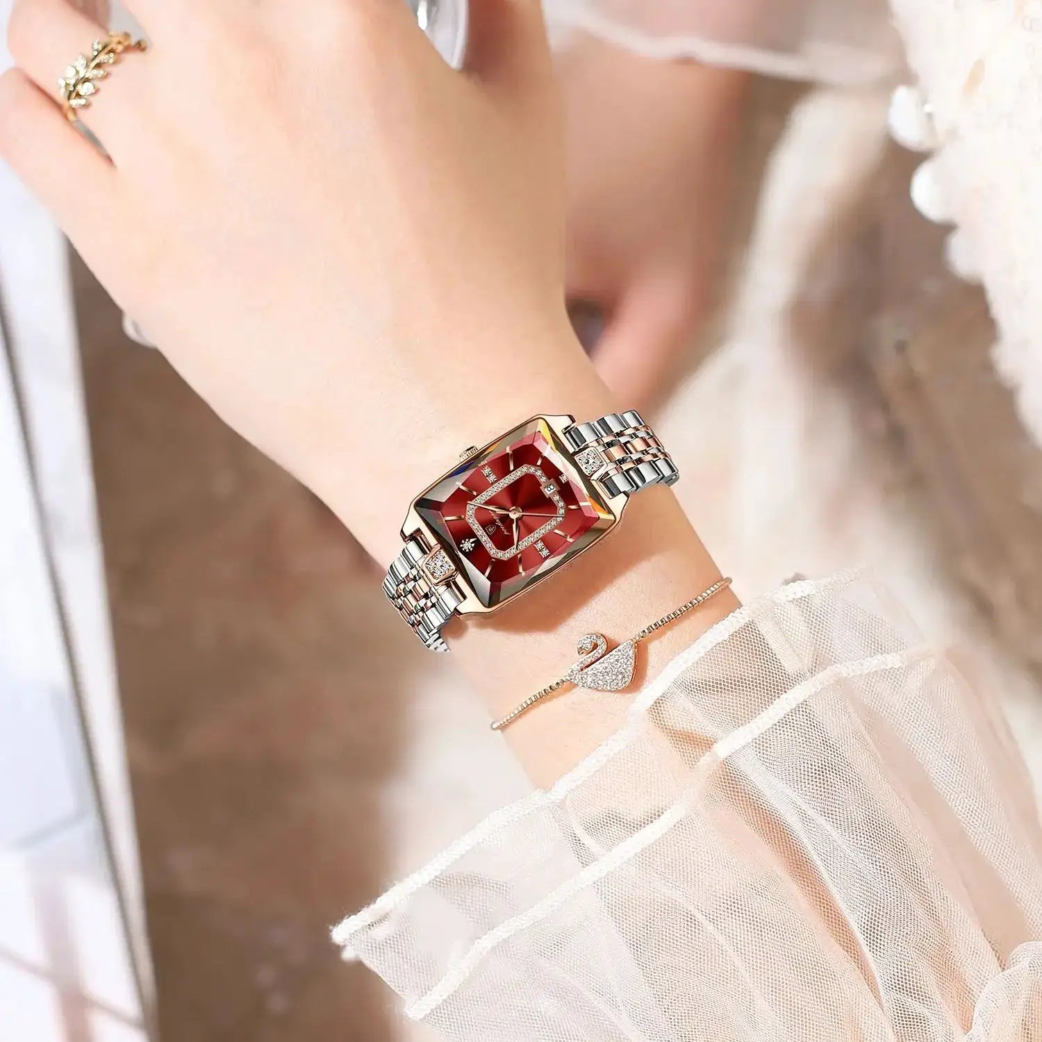 POEDAGAR luxury rectangle women's watch with red dial and crystal accents, two-tone silver and rose-gold bracelet