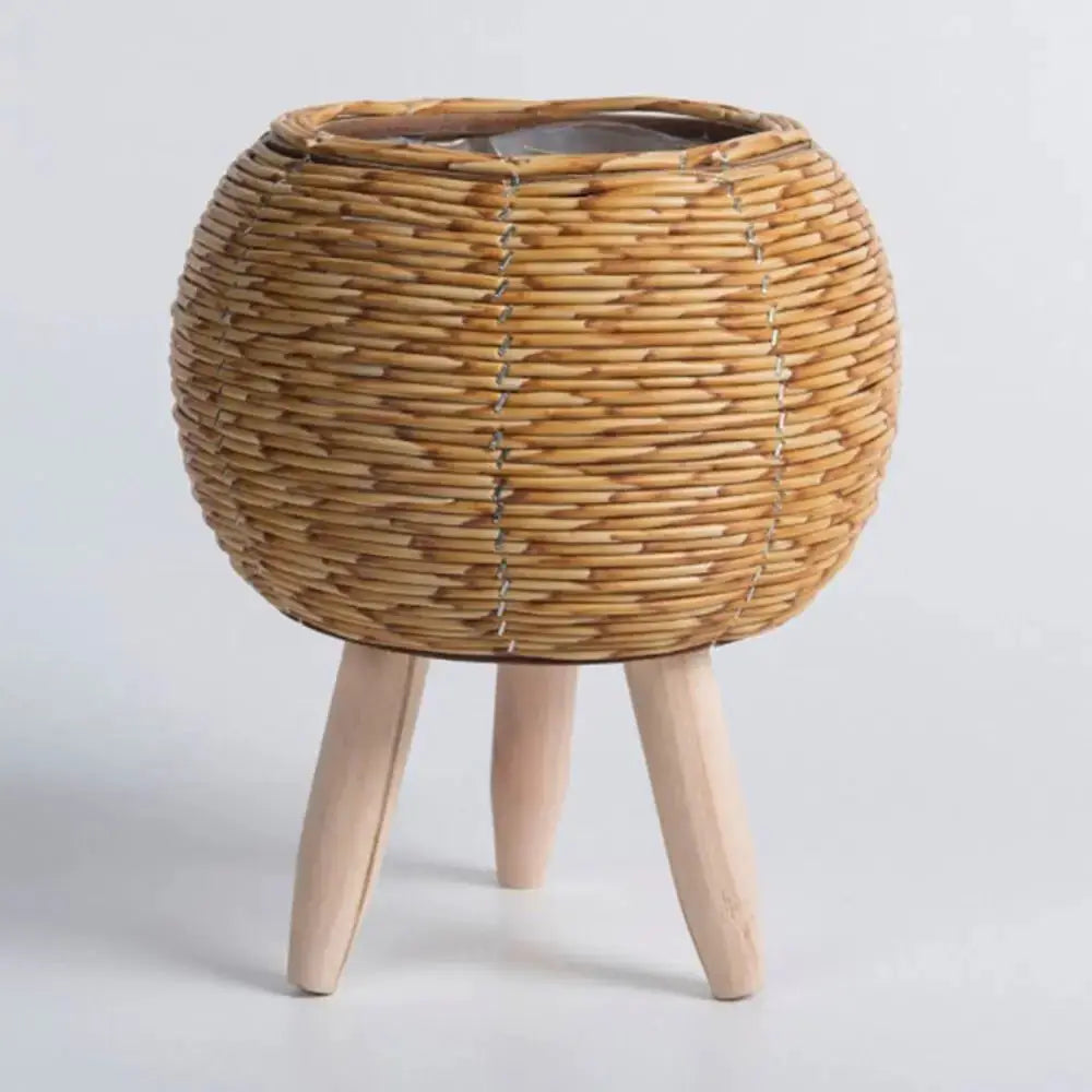 Rattan woven flower pot on natural wood legs; hand-woven planter with removable legs