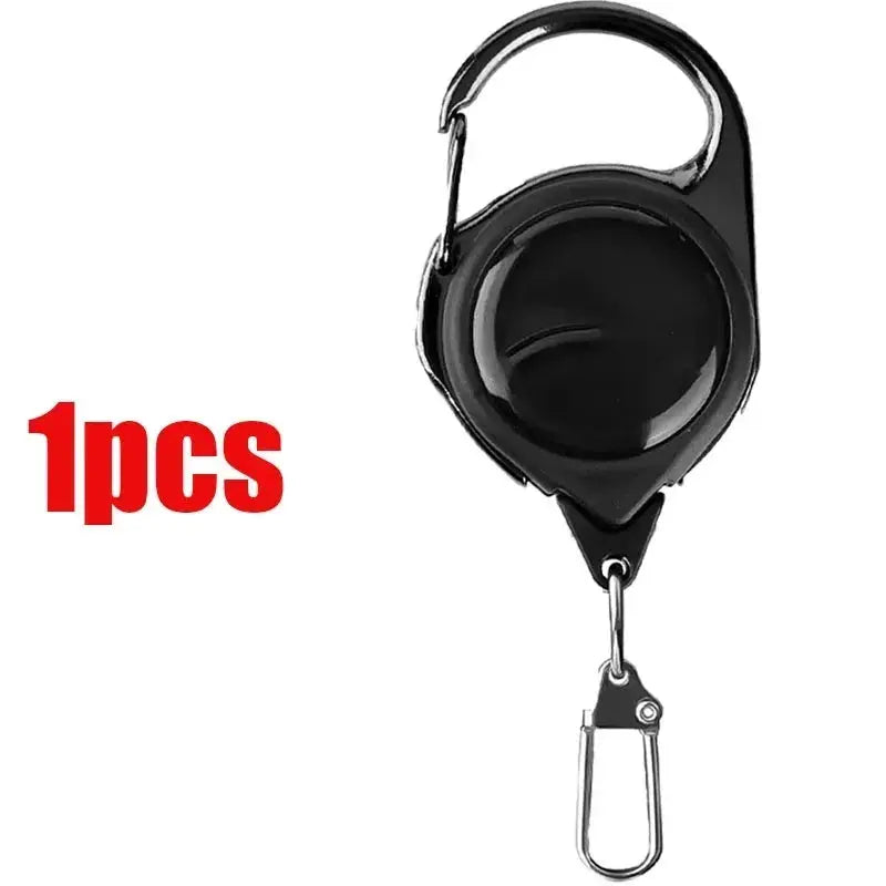 Simples Market retractable pull reel with carabiner keychain, black body and silver clip