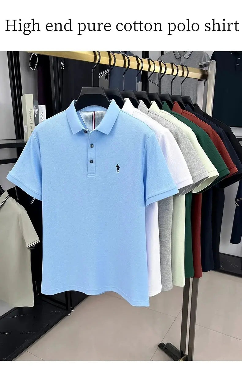 Polo shirt by Simples Market in light blue with pony embroidery; 100% cotton polo, assorted colors on rack