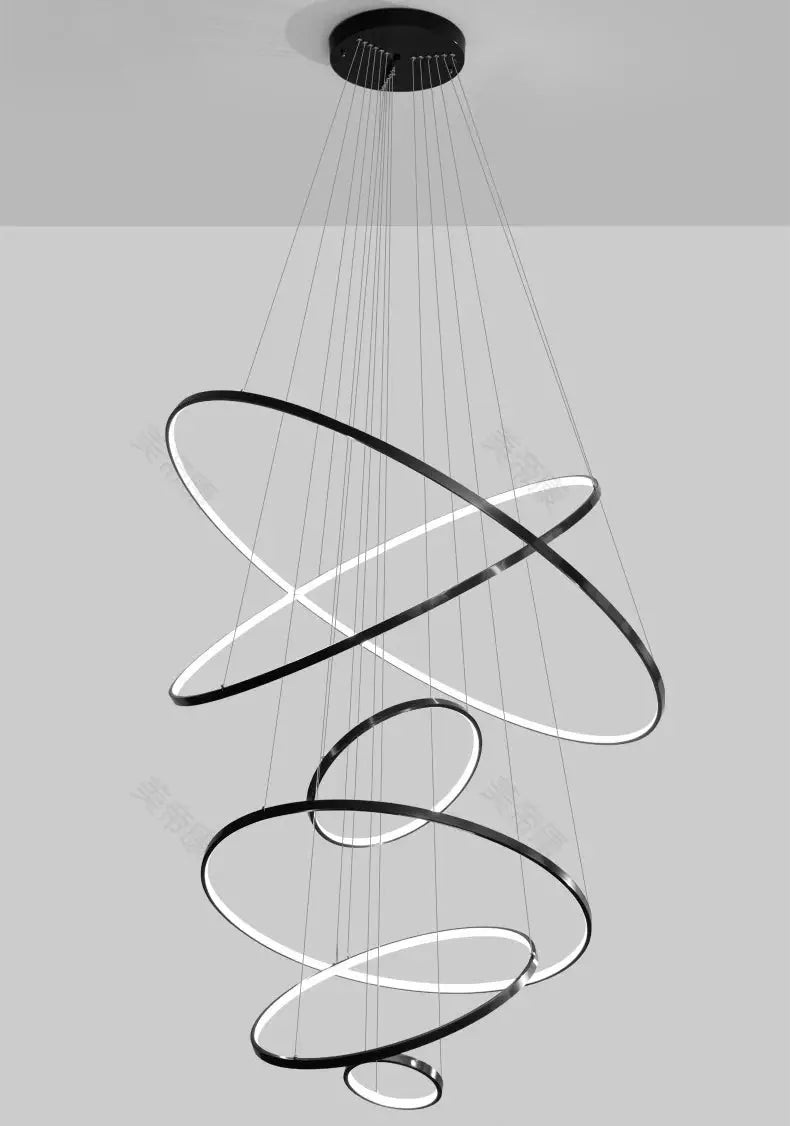 Pendant light by Simples Market with black metal spiraling LED rings for living room