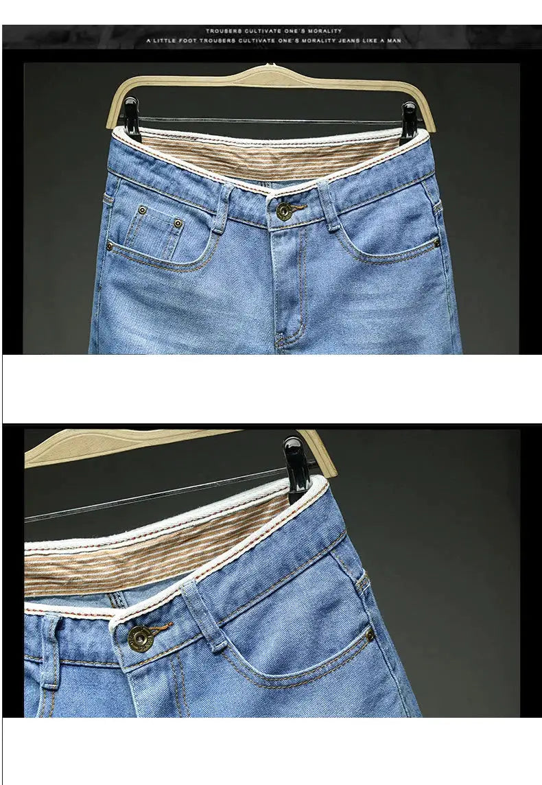 Men's denim shorts by Simples Market, light blue slim-fit jean shorts on a hanger