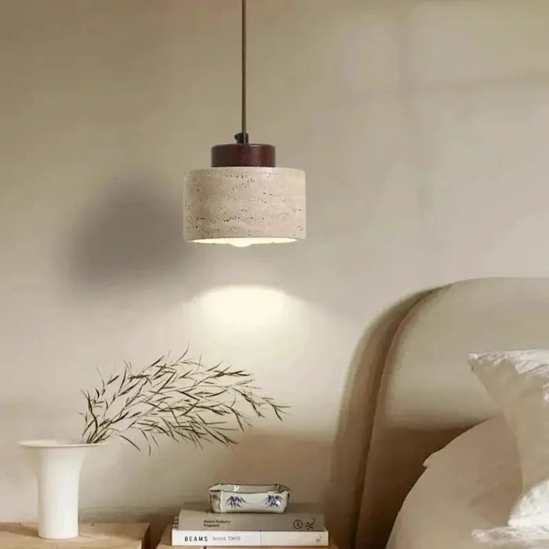 Led pendant lamp yellow cave stone chandelier over bedside table in neutral bedroom