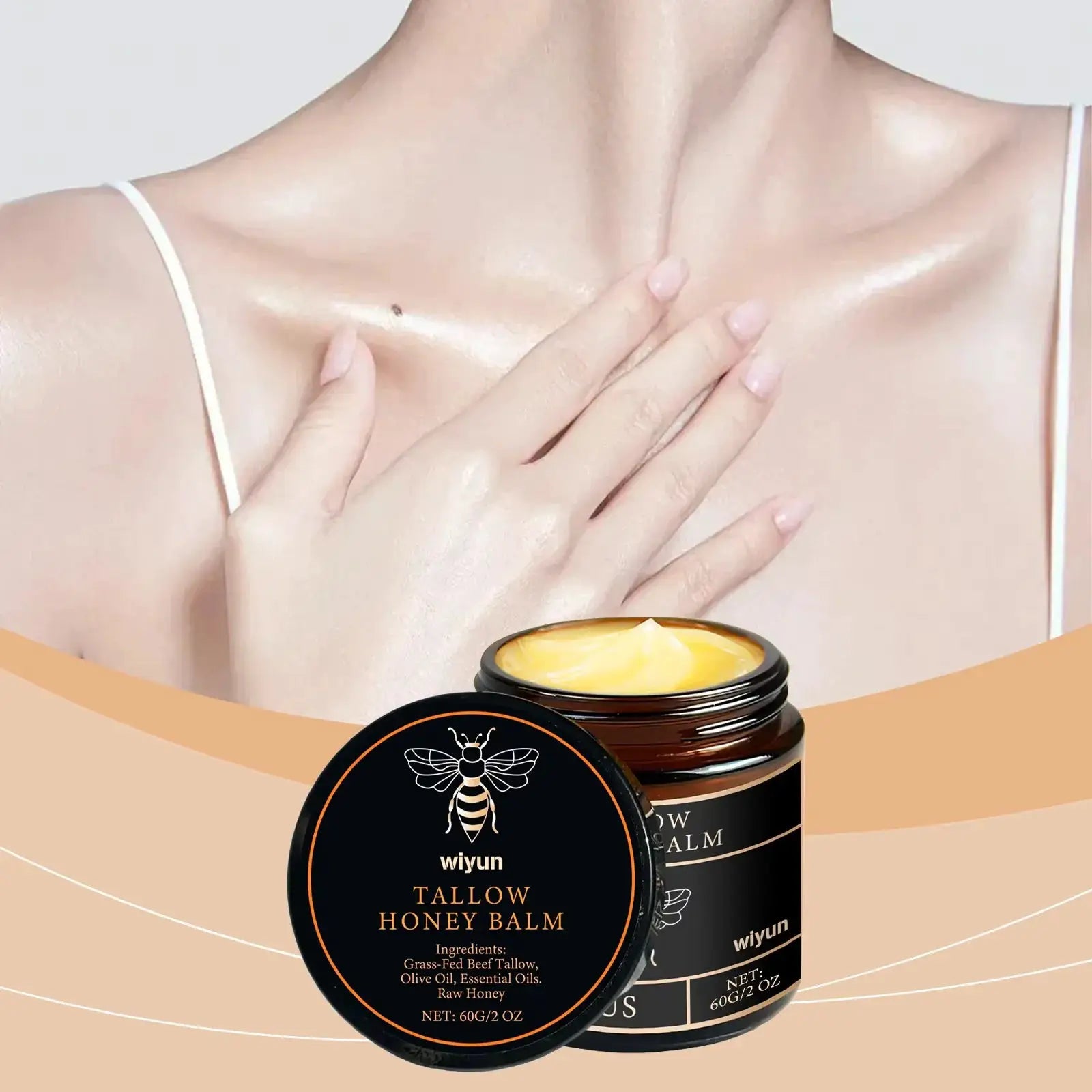 Wyun Tallow Honey Balm jar with yellow balm; black container with bee logo for moisturizing, glowing skin