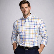 Simples Market men's long-sleeve oxford plaid shirt in white with blue and yellow checks.