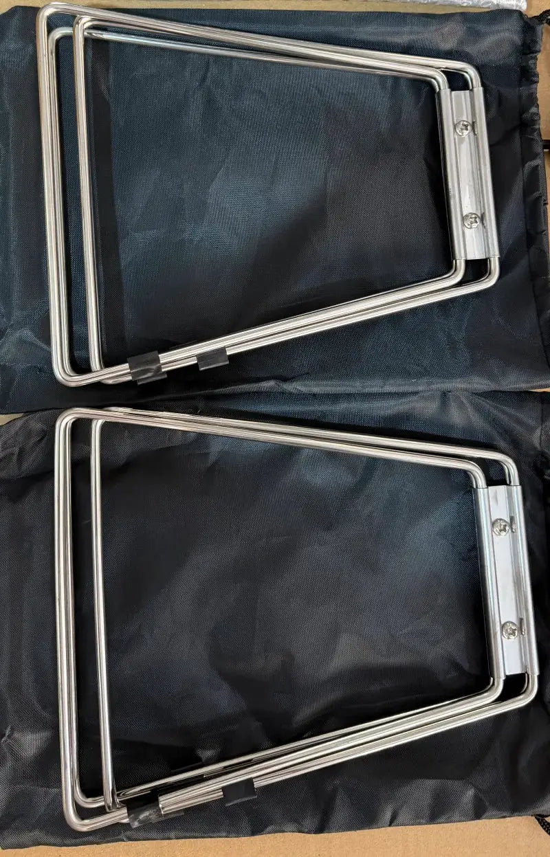 Two folding cooler box stands with silver metal frames and hinged joints
