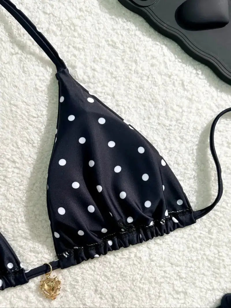 Simples Market black white polka dot triangle bikini top with ruched elastic edge and gold charm.