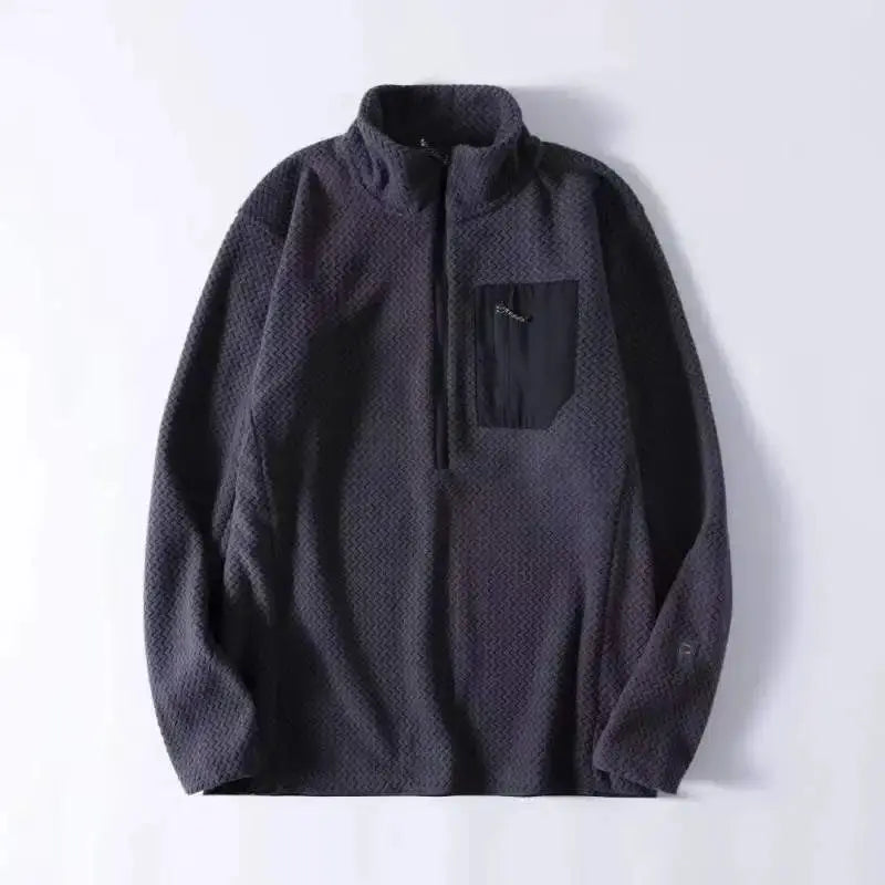 Fleece sweatshirt in dark gray with textured pattern, stand collar, long sleeves, left chest zip pocket.