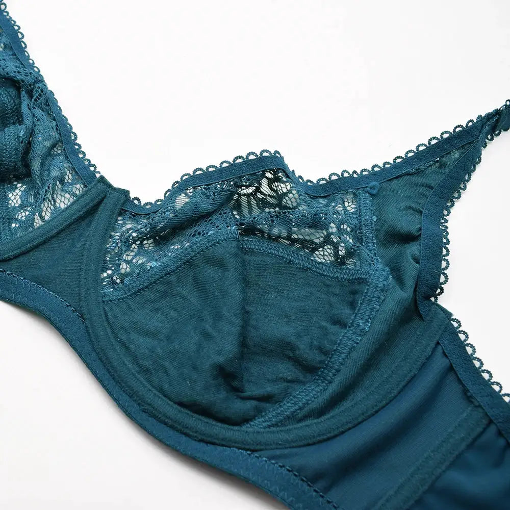 Plus size teal lace bra with scalloped trim and lace cups