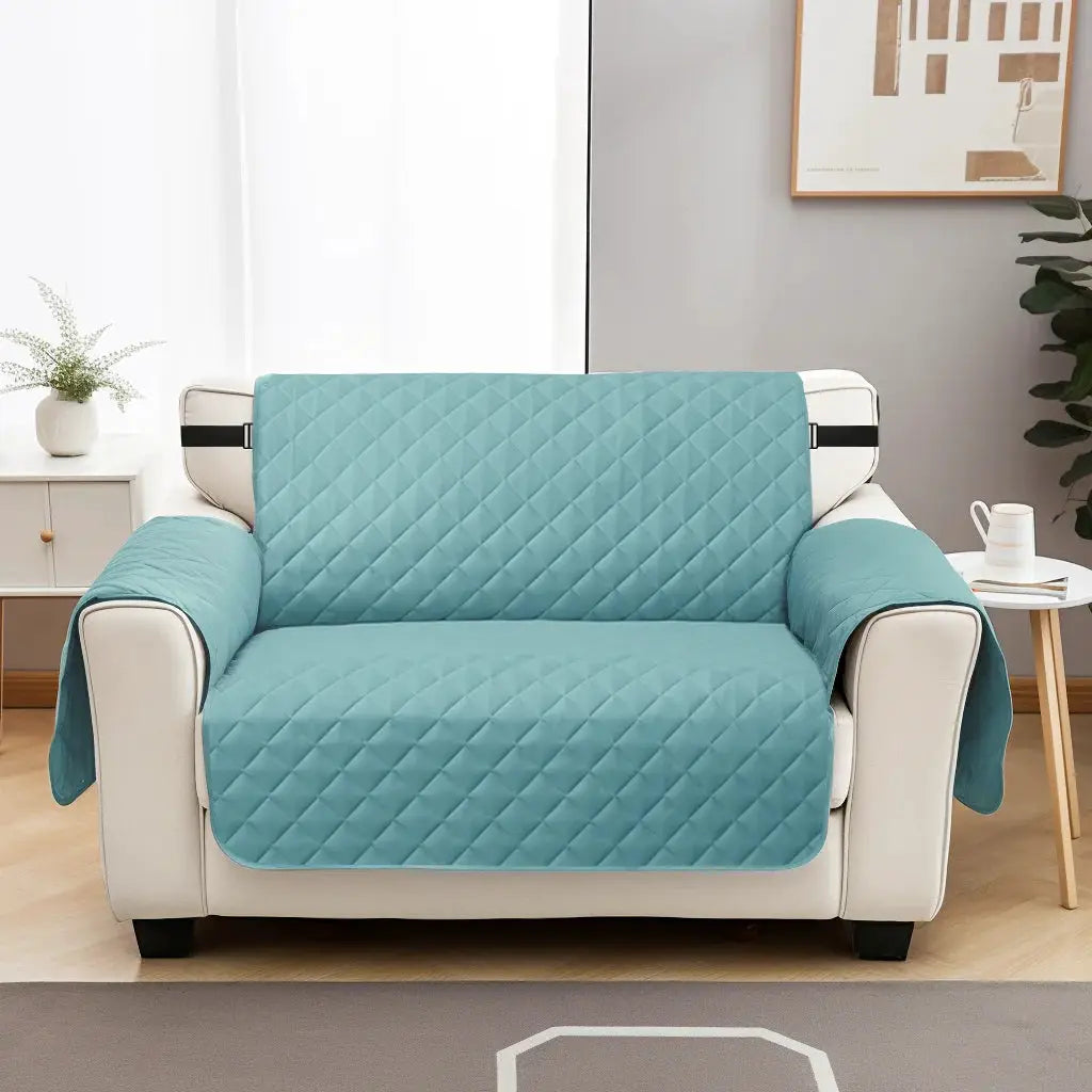 Simples Market waterproof quilted sofa cover for 1–4 seater in teal with elastic strap