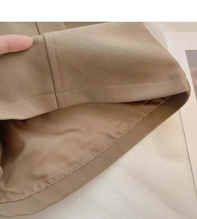 Casual women's high-waist A-line beige shorts; inner lining visible.