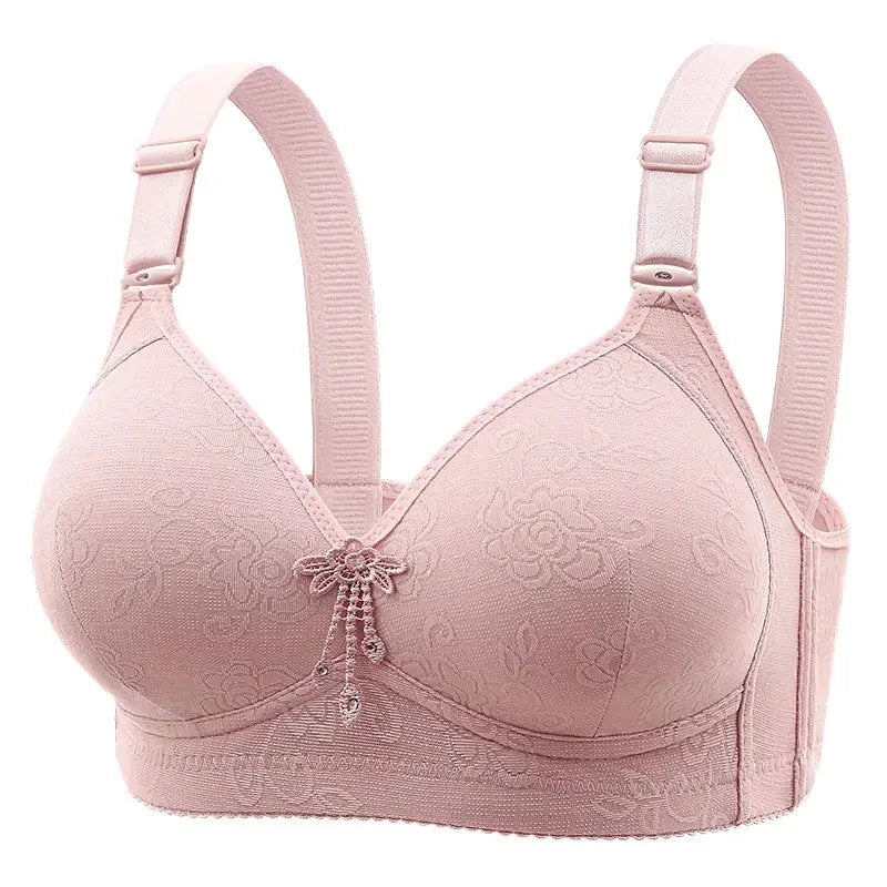 Pink lace non-underwire padded bra with floral pattern and front bow, breathable and comfortable