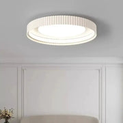Modern round LED ceiling light by Simples Market, white metal fixture for master bedroom décor