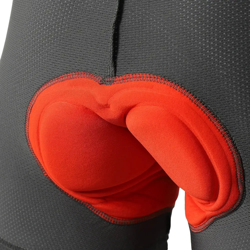 FVXVXV men's cycling shorts with orange 4D padded liner on black breathable quick-dry fabric
