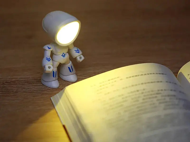 Mini Night Light LED cartoon police hero desk lamp by Simples Market, white figure with blue accents and a glowing head.