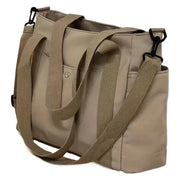 Large capacity beige nylon crossbody bag with a removable shoulder strap
