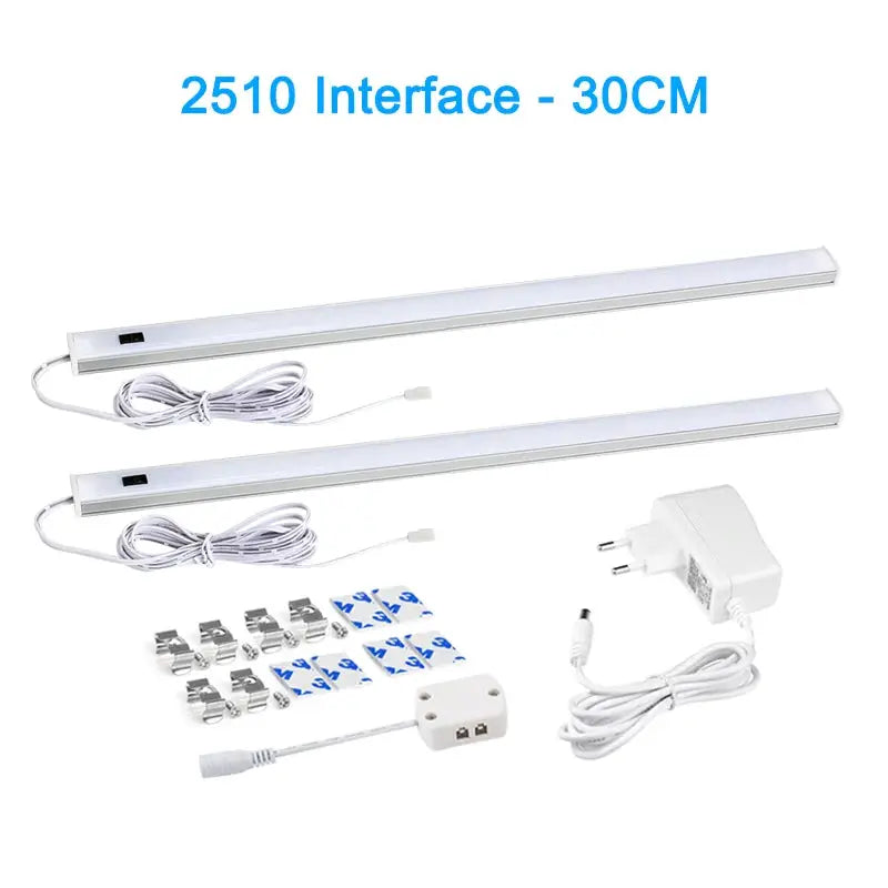 Simples Market LED under-cabinet lights set, 30cm, two slim strips with adapters and mounting accessories.