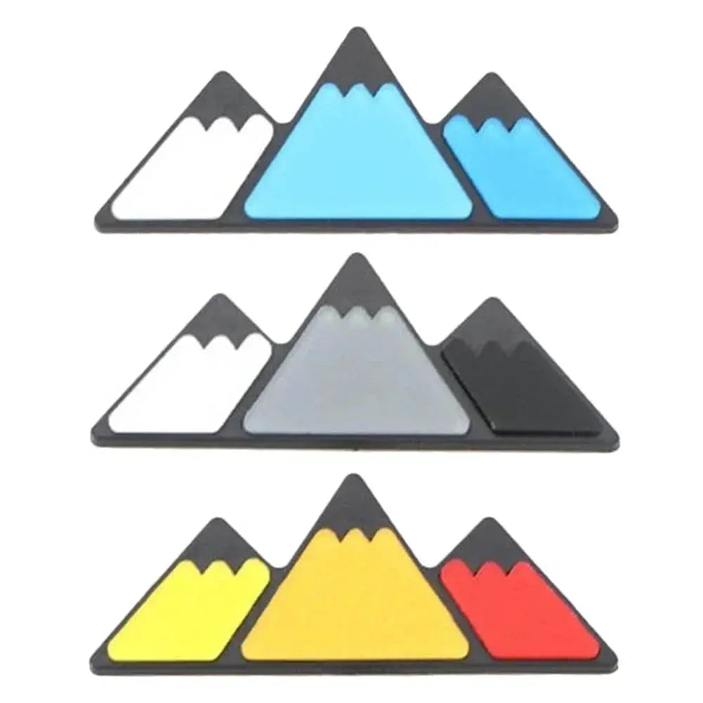 Simples Market nine-piece mountain grille badge set for Toyota models in blue/gray/yellow-red colorways