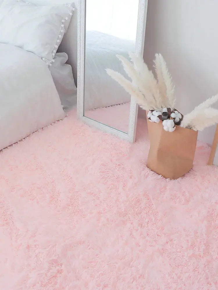 Kids pink fluffy shag rug for bedroom, soft plush pile.