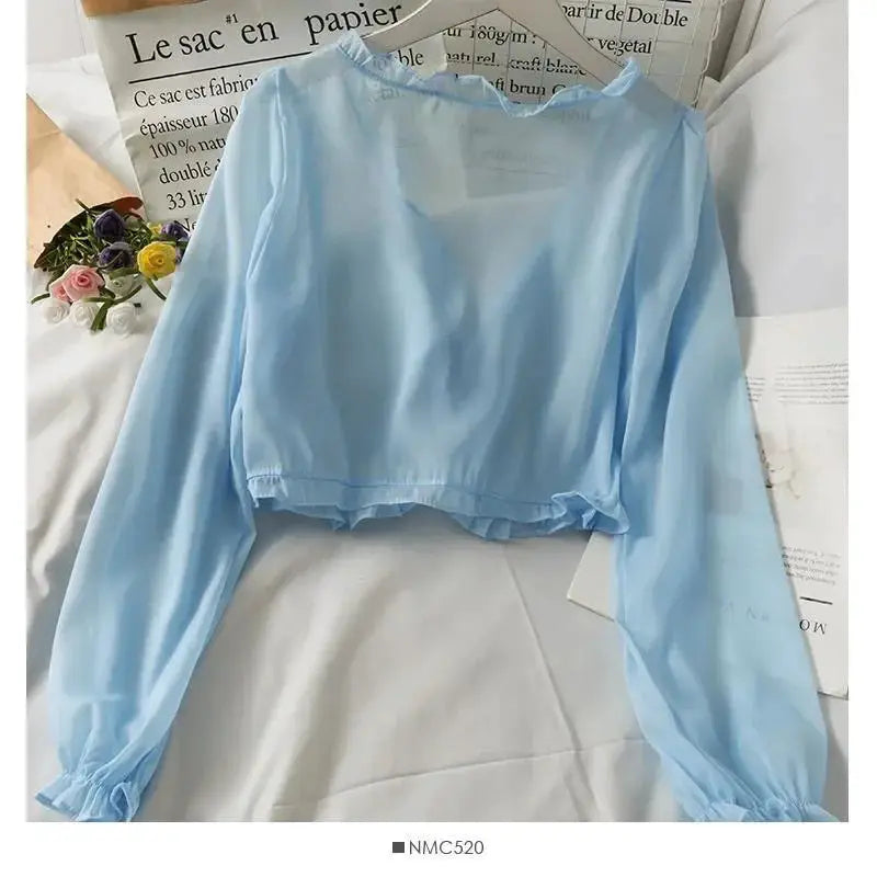 Light blue cropped long-sleeve sheer blouse with ruffled neckline and elastic hem, Simples Market