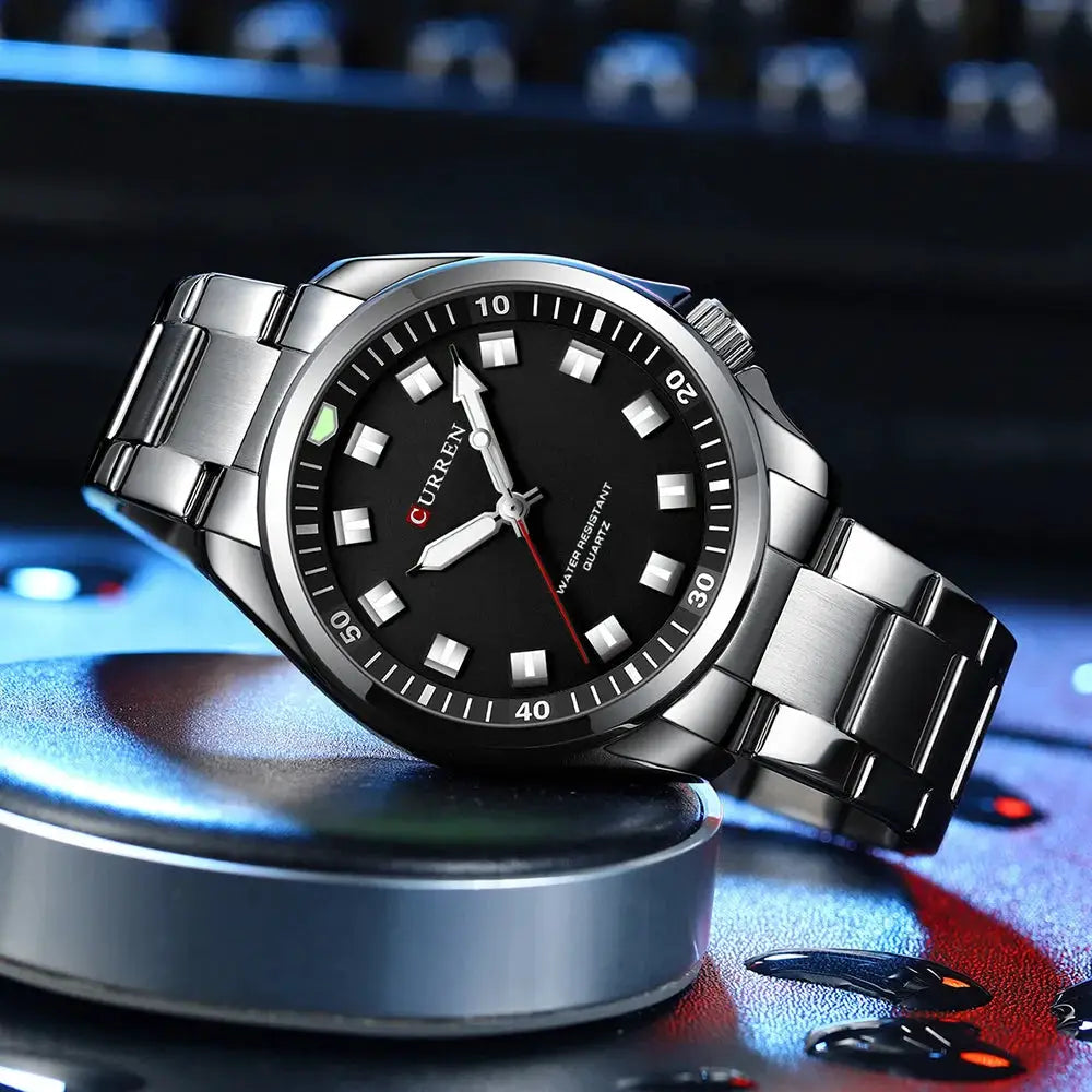 CURREN 8451 stainless steel men's wristwatch with black dial, silver bracelet, water resistant.