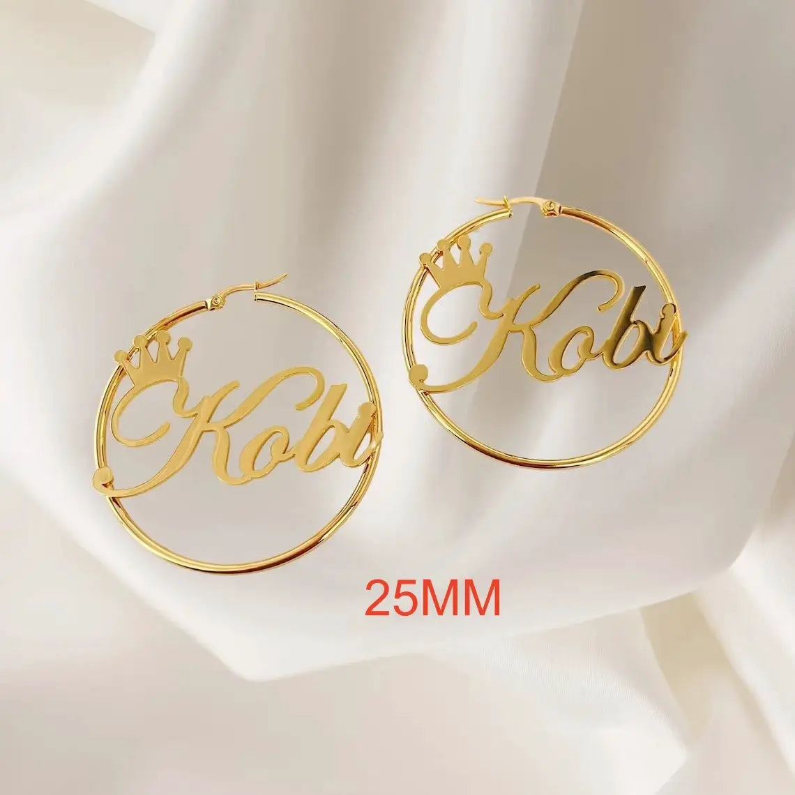 Gold stainless steel name hoop earrings with crowned Koby script, 25mm pair
