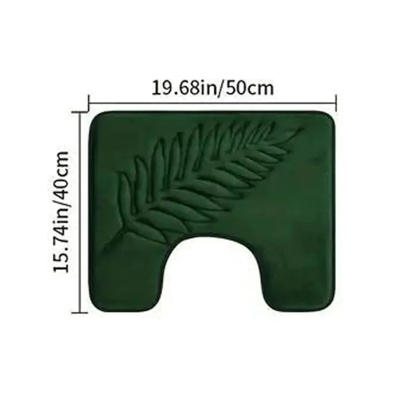 Green memory-foam toilet contour bath mat with leaf pattern, part of a 3-piece bath mat set