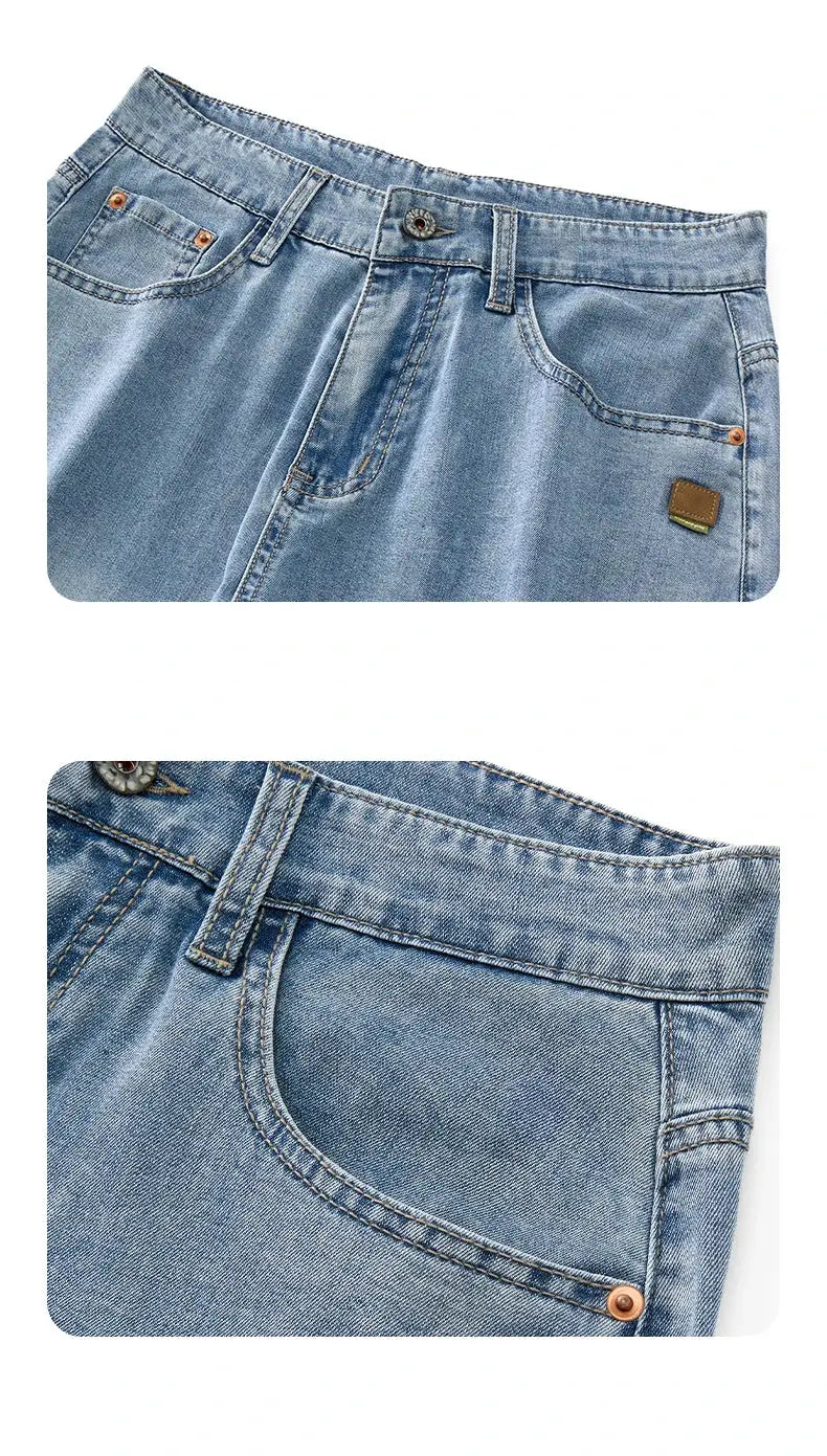 Light-blue denim jeans with copper rivets and a brown logo patch, straight casual trousers