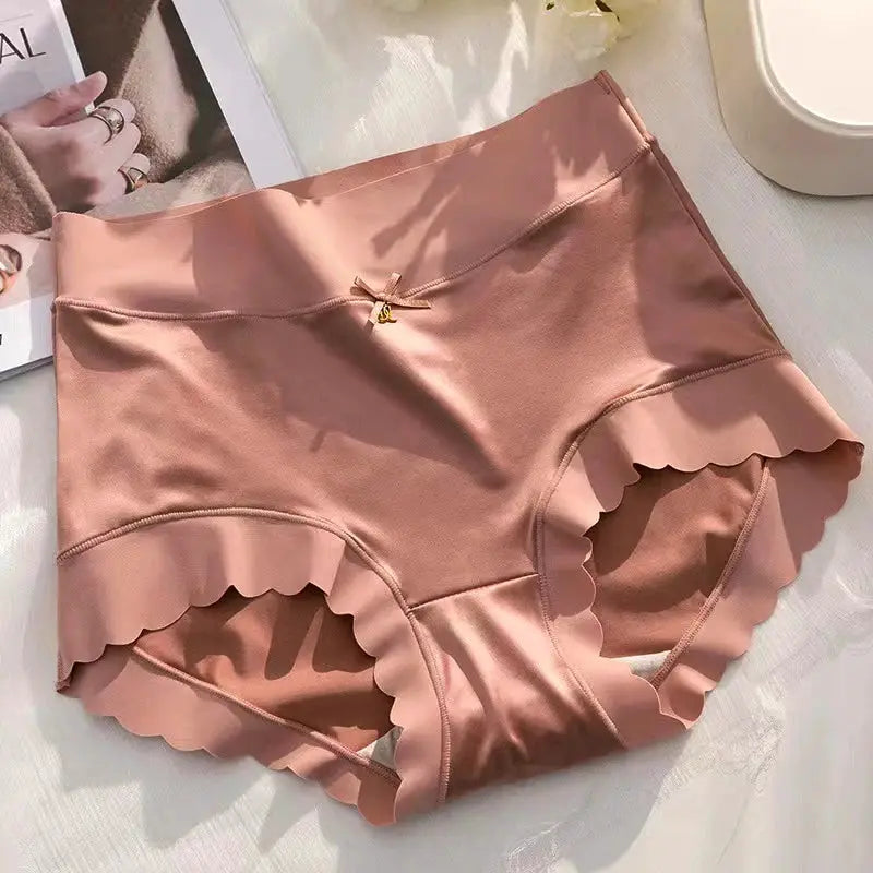 Silk panties mid-rise brief in blush pink with scalloped trim and small bow.