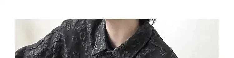 2XL black crumpled jacquard shirt with turn-down collar and bat-wing sleeves.