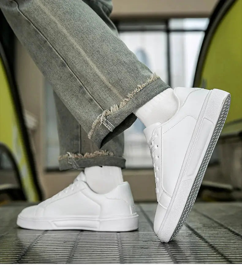 Pair of white PU leather men's sneakers, casual vulcanized style