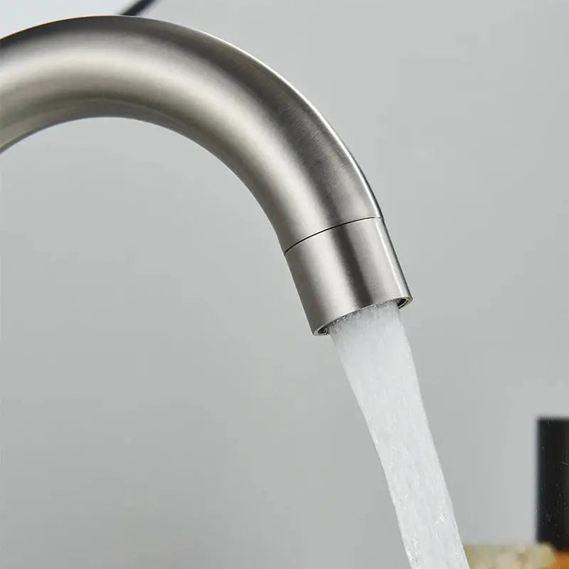 Bathroom basin faucet in 304 stainless steel with a 360° rotating spout