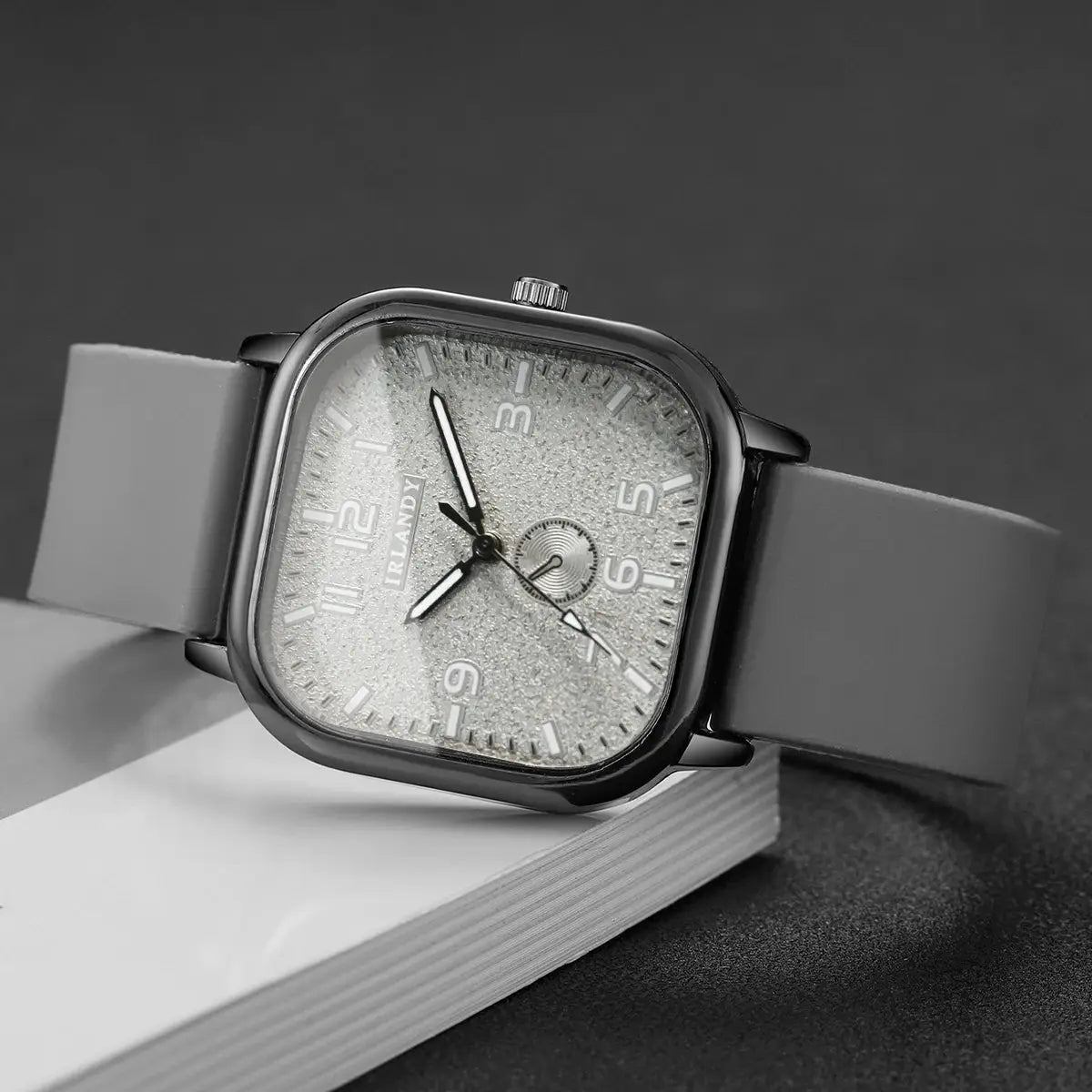 Fashion square wristwatch with gray silicone strap and glitter silver dial