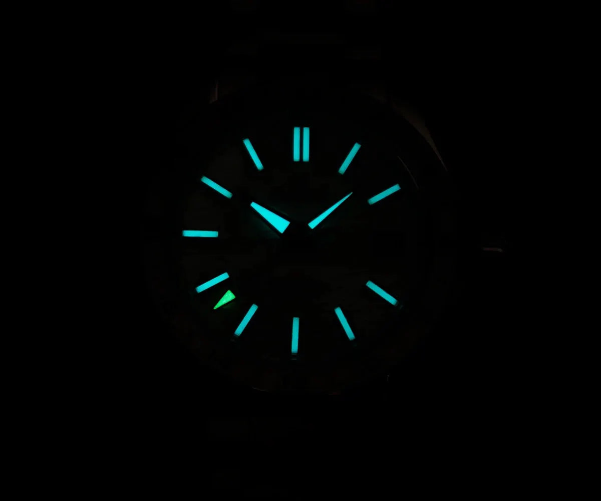 Cronos GS mechanical men's watch by Simples Market with 39mm case and luminescent blue-green markers and hands.