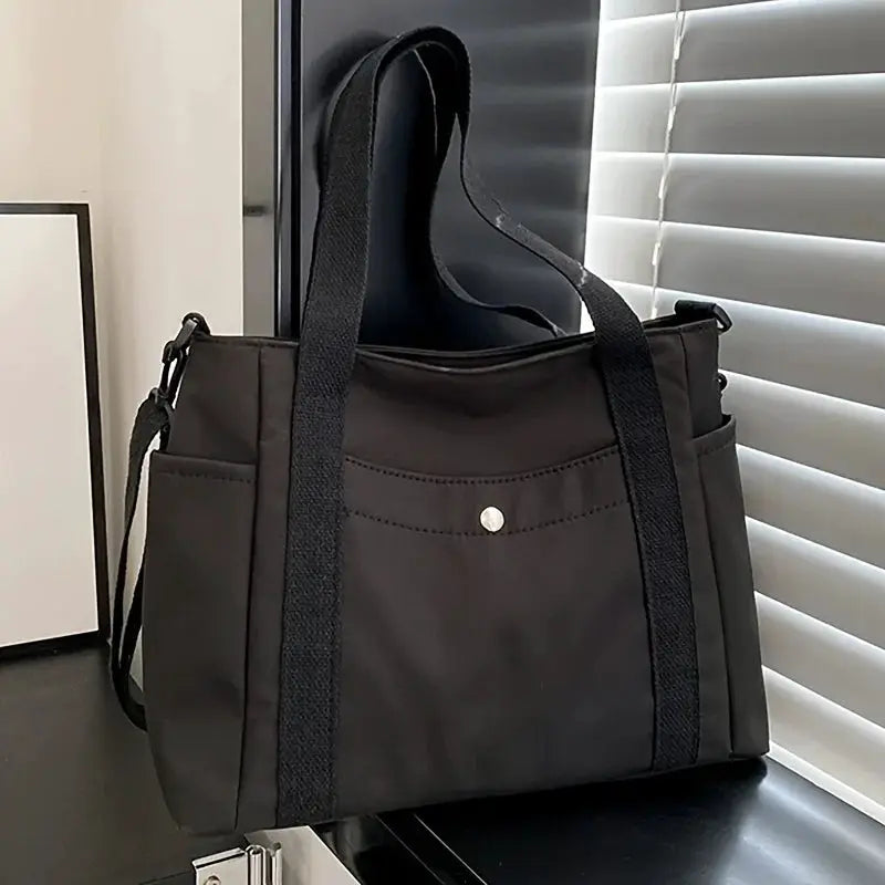 Large capacity nylon crossbody bag with removable strap, black messenger shoulder bag.