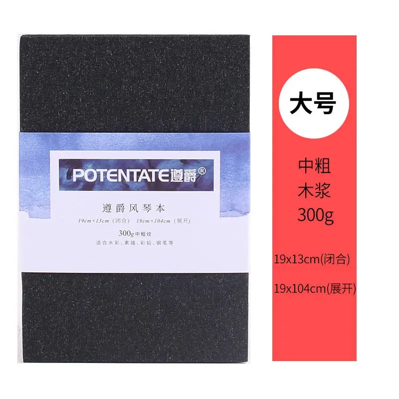 Mini watercolor sketchbook with black cover and blue label, POTENTATE