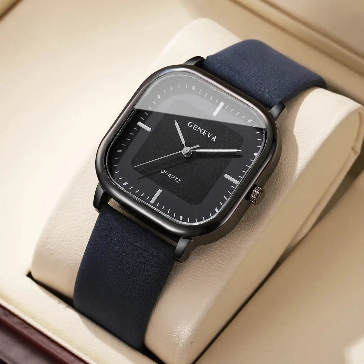 Geneva square-dial men's quartz watch with navy leather strap.