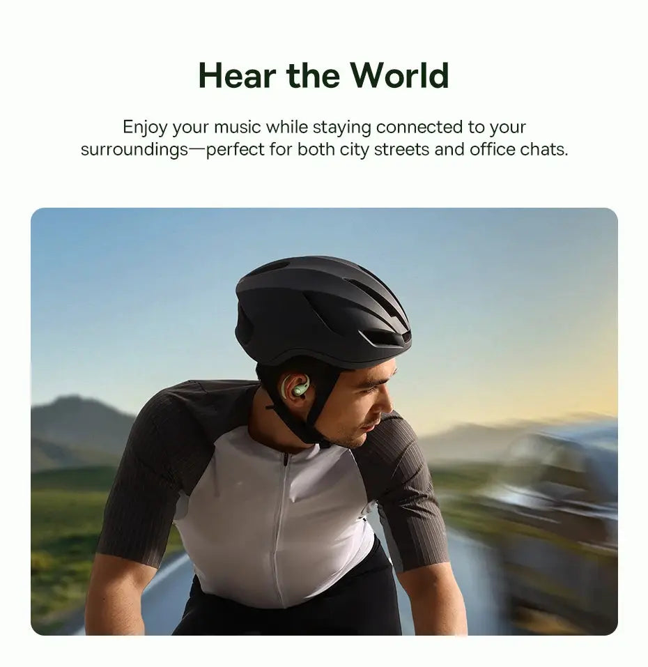 Baseus Eli Sport 2 open-ear wireless earphones with green accents worn by a cyclist