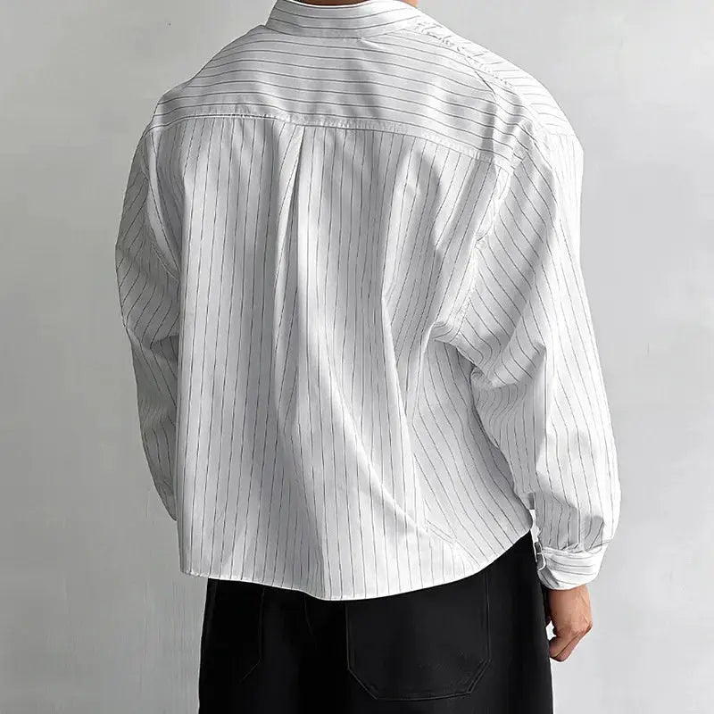 Men's striped shirt, white with thin vertical pinstripes, loose fit long sleeves, back view