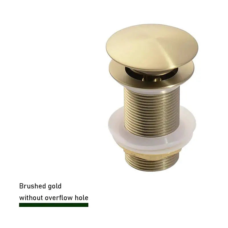 Bathroom sink push-down pop-up stopper drain in brushed gold finish.