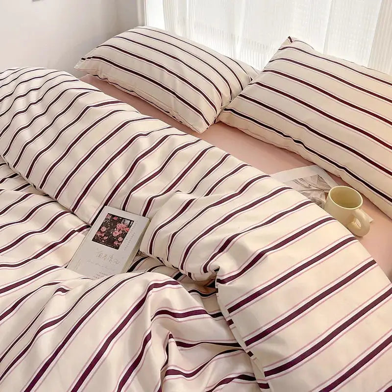 Simples Market four-piece duvet cover and sheet set in washed cotton, cream with red and blue stripes