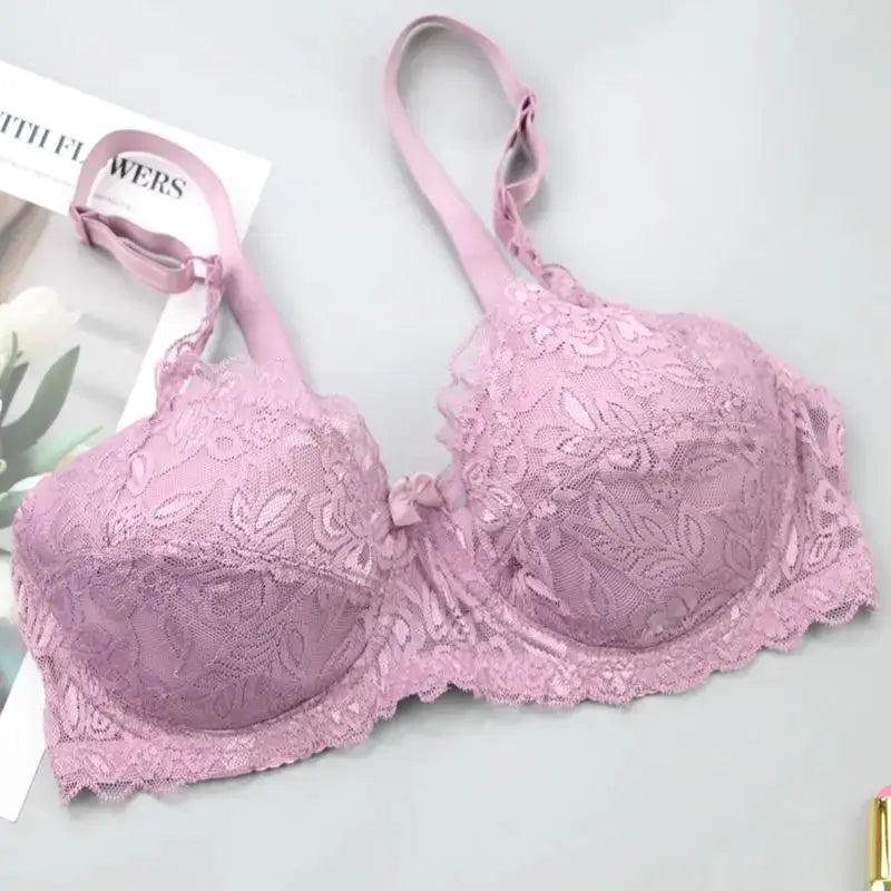 Pink lace push-up bra with floral embroidery, scalloped edges, adjustable straps