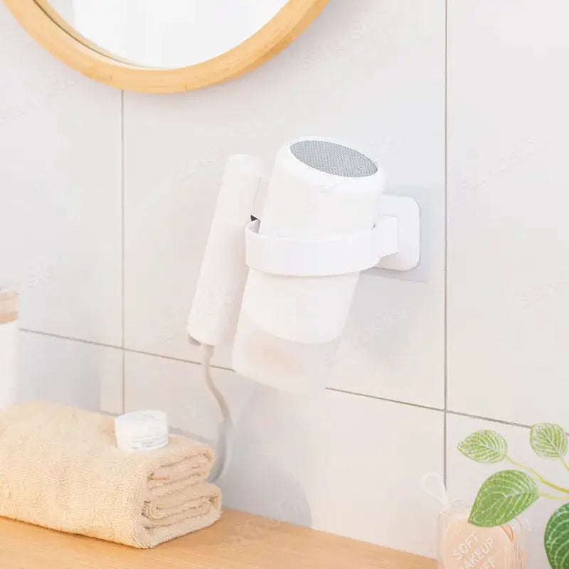 White plastic adhesive wall-mounted hair dryer holder and bathroom storage rack