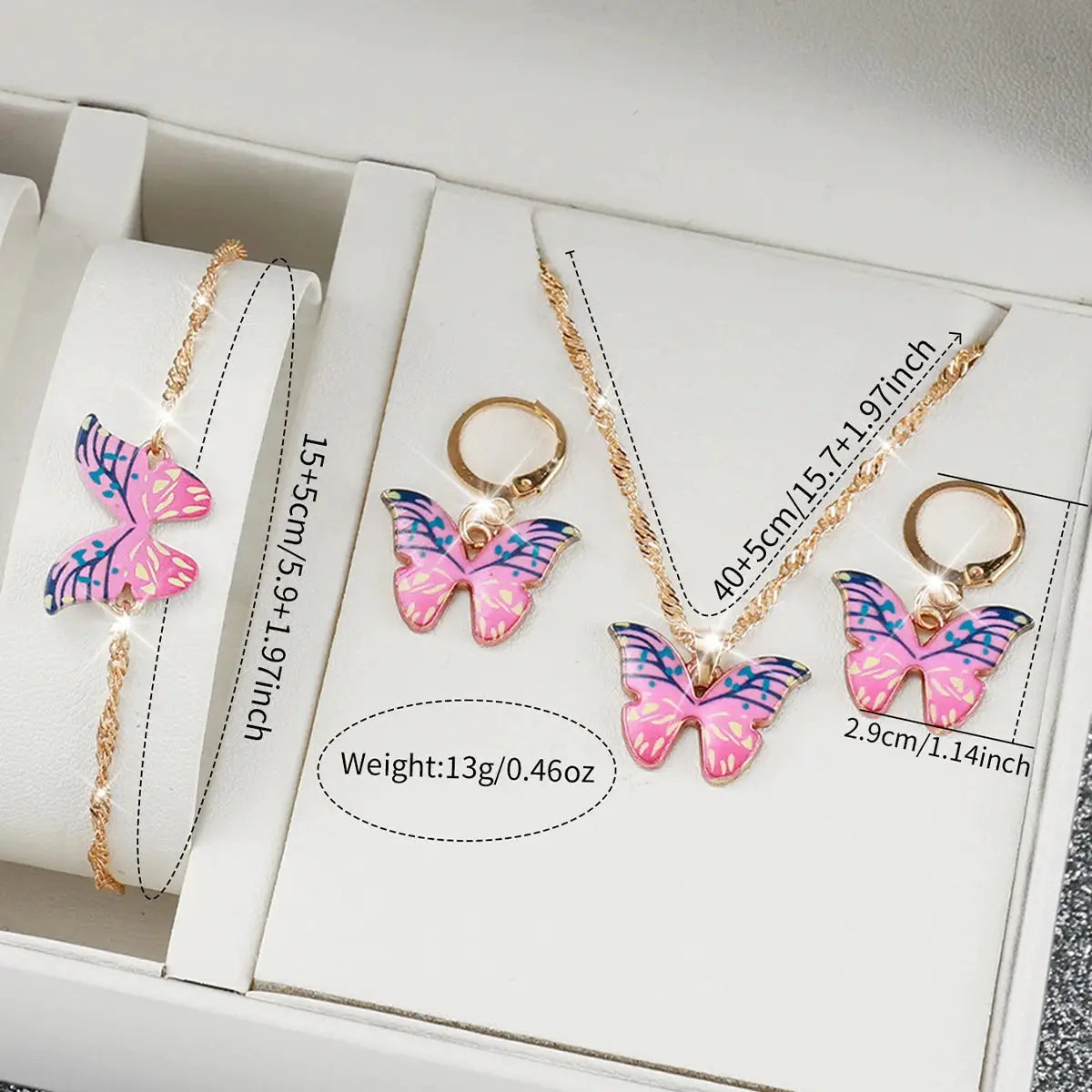 Simples Market women's watch and butterfly jewelry set; pink butterfly charms, silicone bands, gold-tone chains.