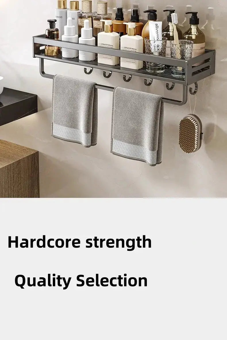 Simples Market no-drill aluminum bathroom corner shelf with towel rack, five hooks, shampoo bottles, and two gray towels.