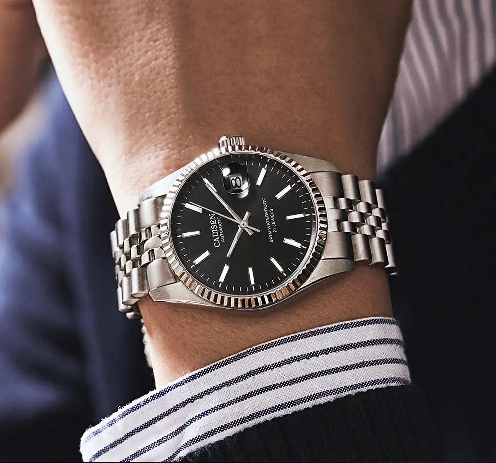 CADISEN men's stainless steel bracelet automatic watch with black dial and date magnifier