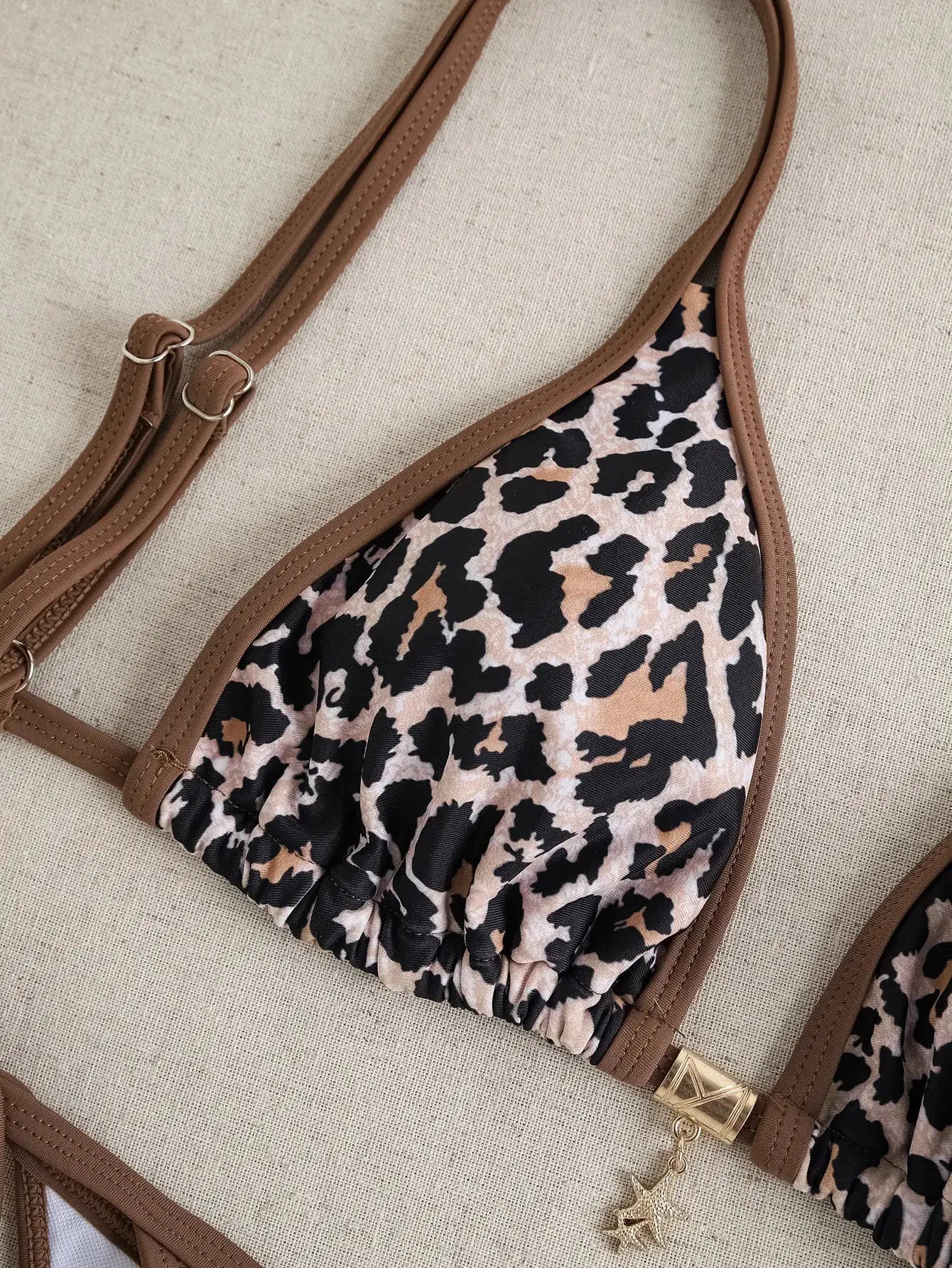 Simples Market two-piece triangle bikini set with leopard print and brown trim