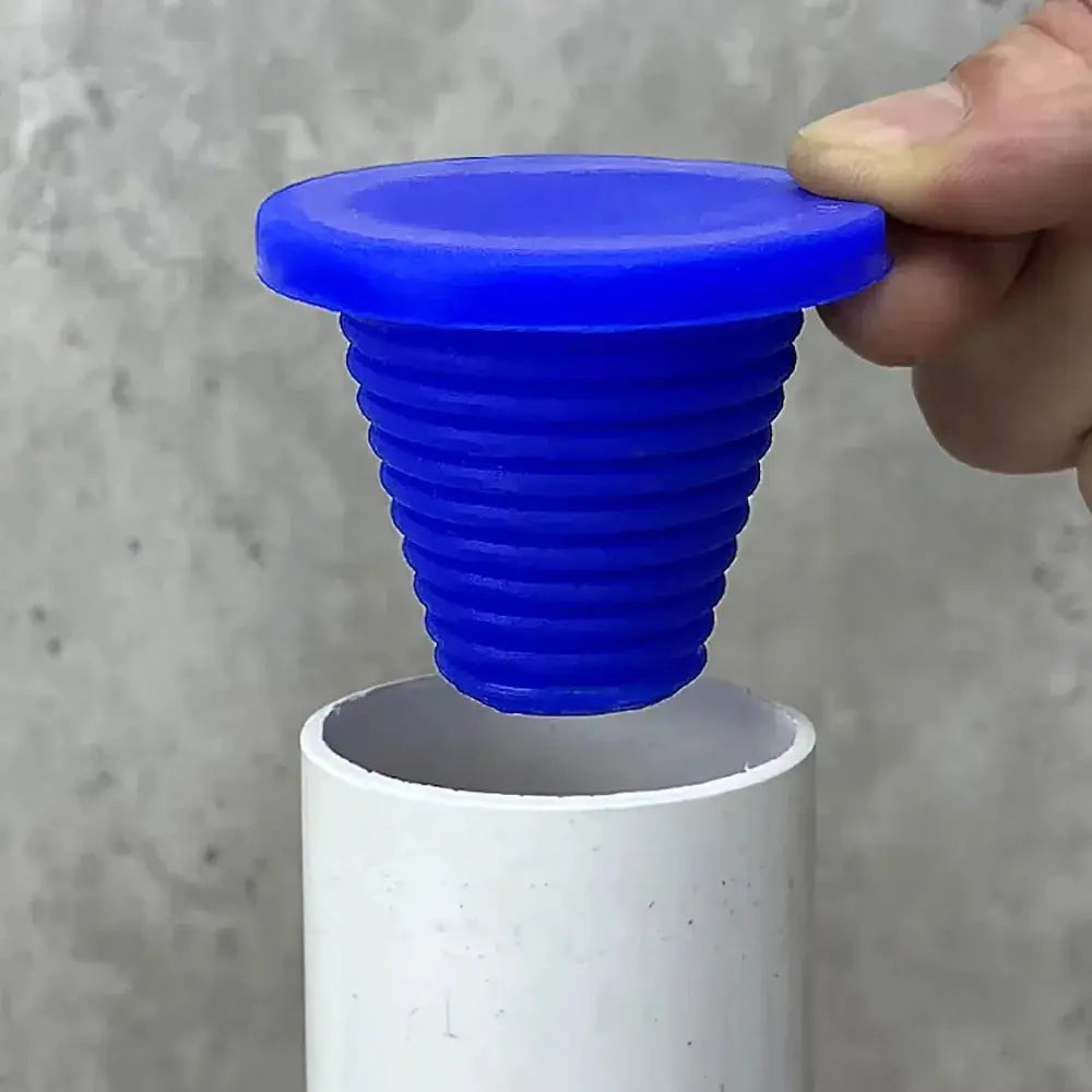 Blue silicone sewer pipe sealing plug with ribbed bell, anti-odor stopper for floor drains and showers.