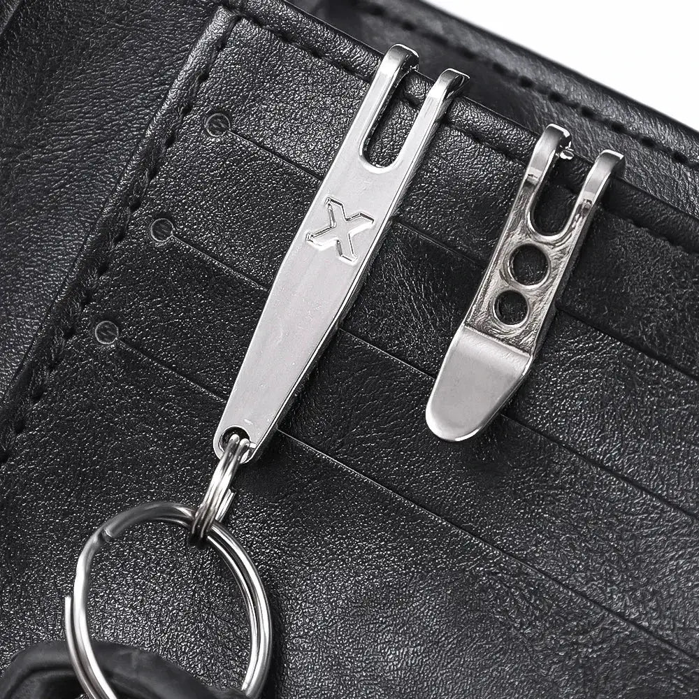 EDC bag pocket suspension clip with key carabiner; two silver metal clips on black leather, keyring attached